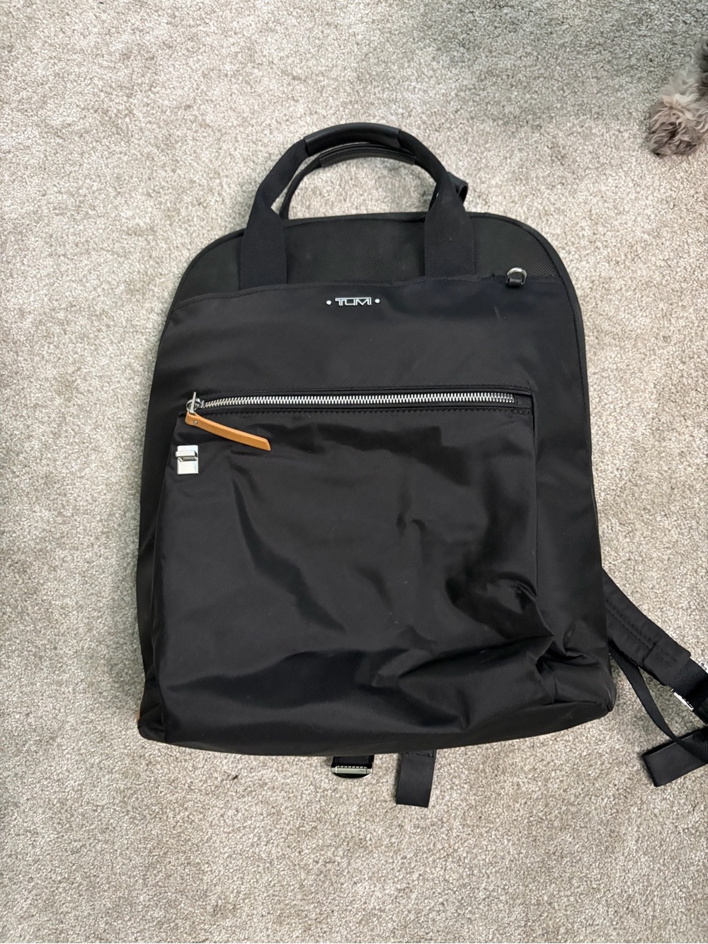 Tumi Black Nylon Backpack with Tan Zipper Pull Tab